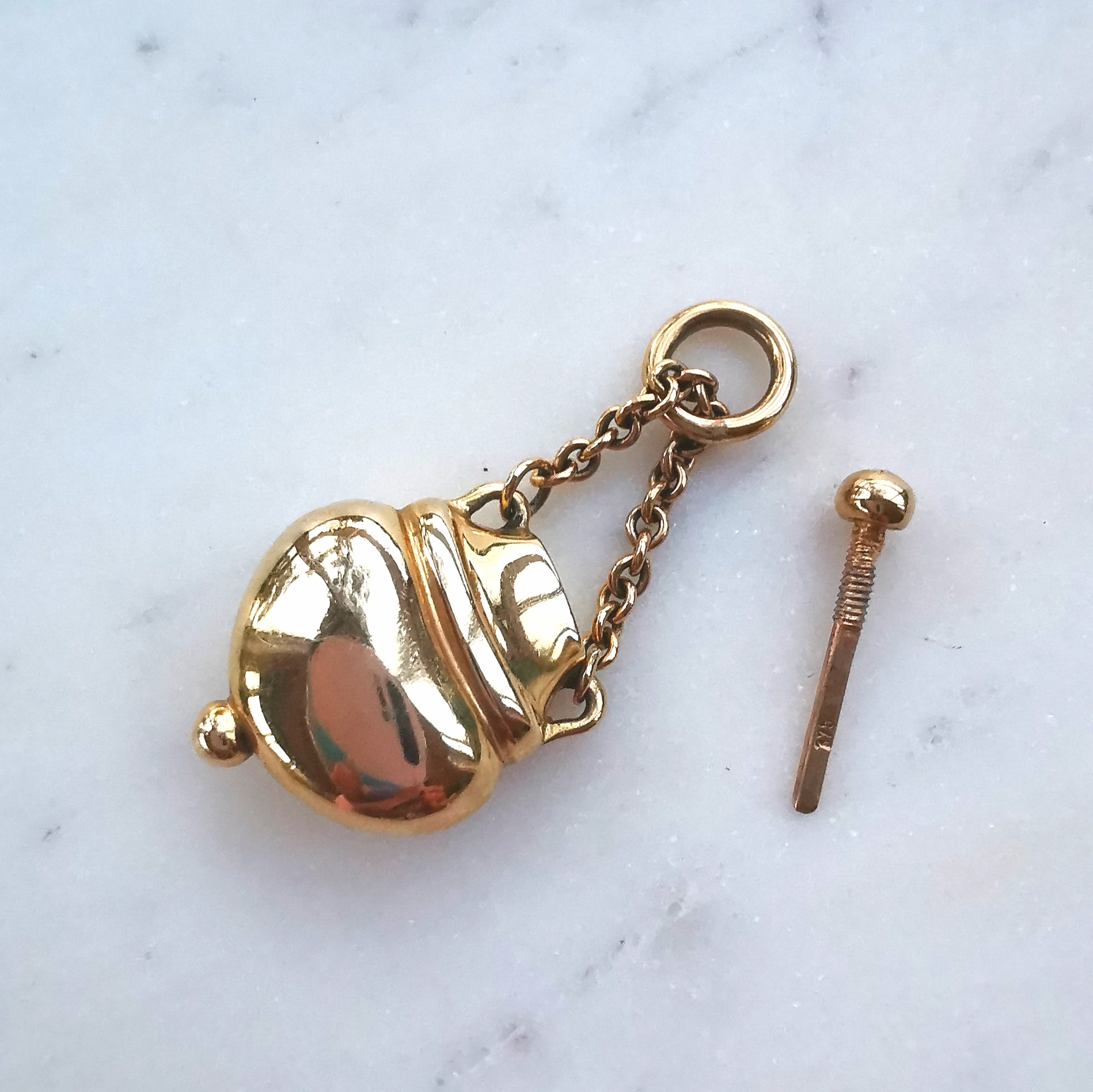 Gold Perfume Bottle Pendant