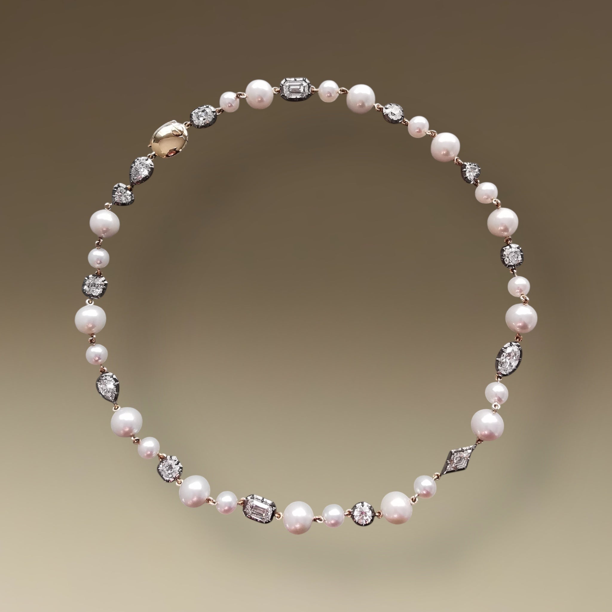 Pearl and collet set diamond necklace